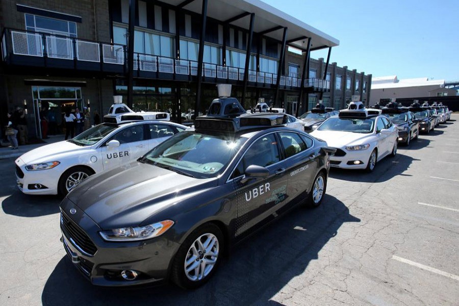 Uber halts self-driving car tests after death