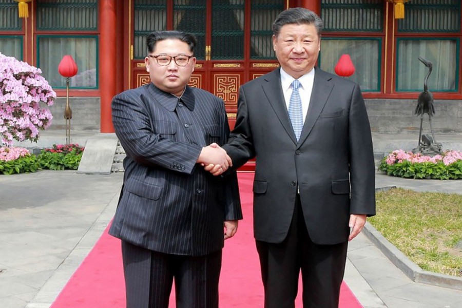 Kim urges Xi to help end sanctions against N Korea