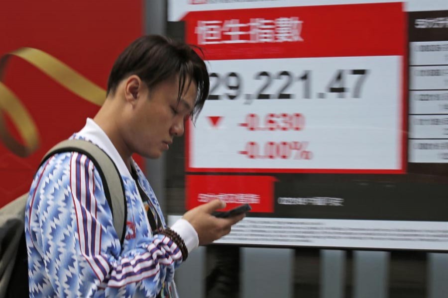 Asian shares slump after Wall St falls