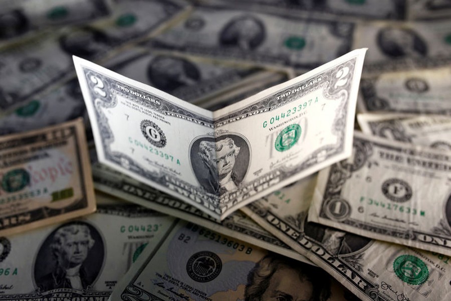 Dollar slips toward a 10-day low on growth concerns