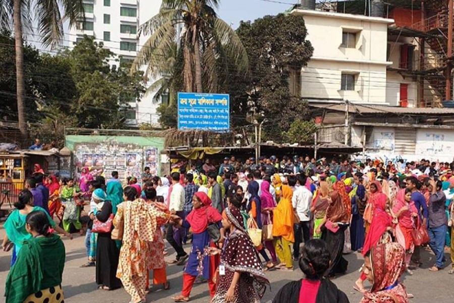 RMG workers resume protests, demand cancellation of wage board