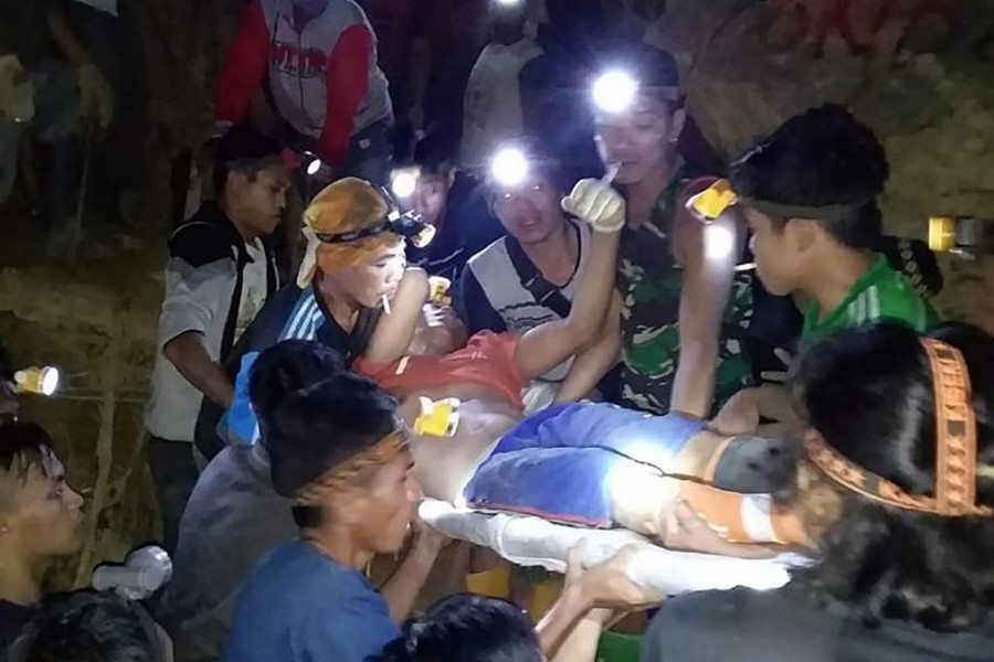 Three dead, 60 feared buried in Indonesia mine collapse