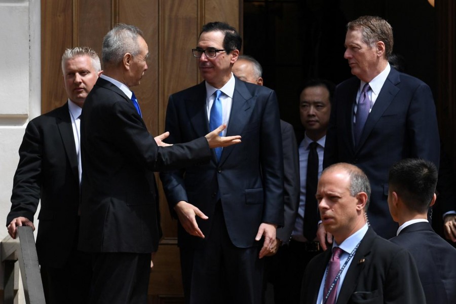 Chinese Vice Premier Liu He talks with US Treasury Secretary Steven Mnuchin and Trade Representative Robert Lighthizer as he leaves trade talks in Washington, US, May 10, 2019 - REUTERS/Leah Millis