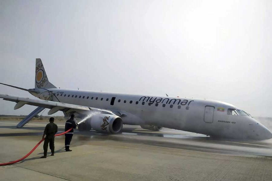 Myanmar passenger jet lands safely after landing gear fails