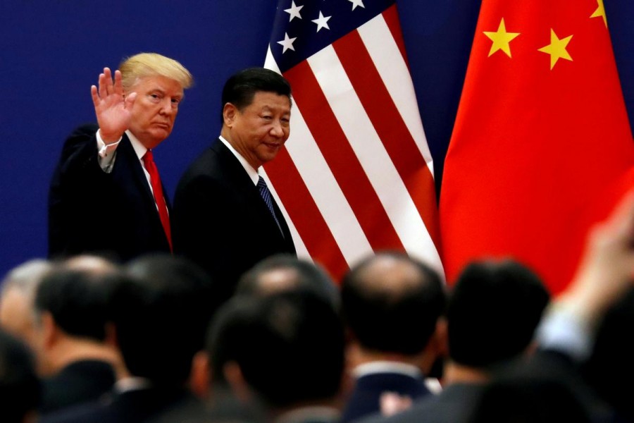 US President Donald Trump and China's President Xi Jinping meet business leaders at the Great Hall of the People in Beijing, China, November 9, 2017. Reuters/Files