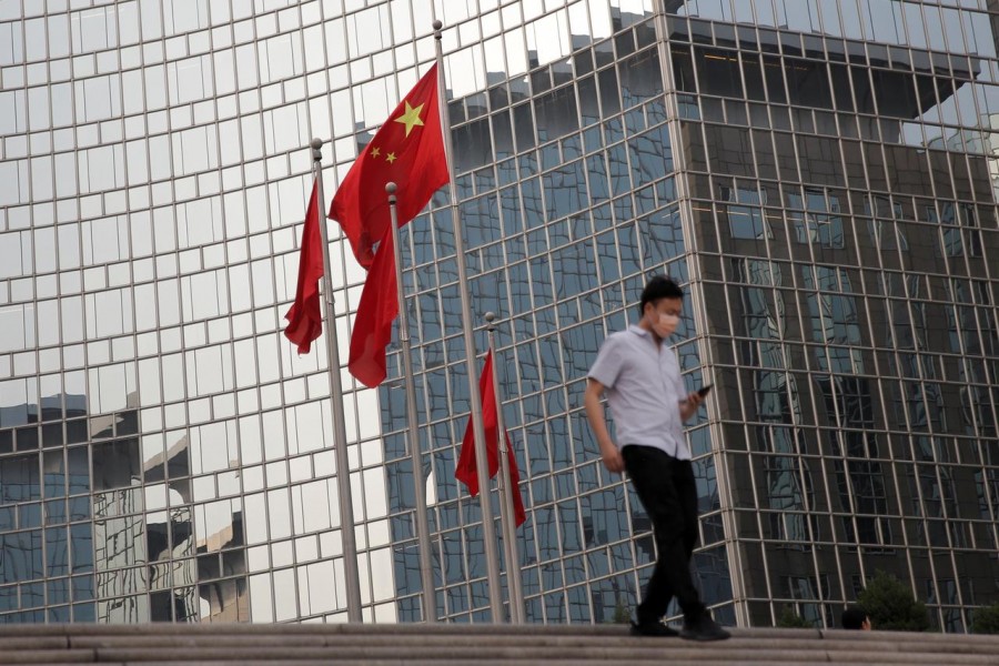 The Chinese national flag flies outside a hotel in central Beijing, China, May 15, 2019. Reuters/Files