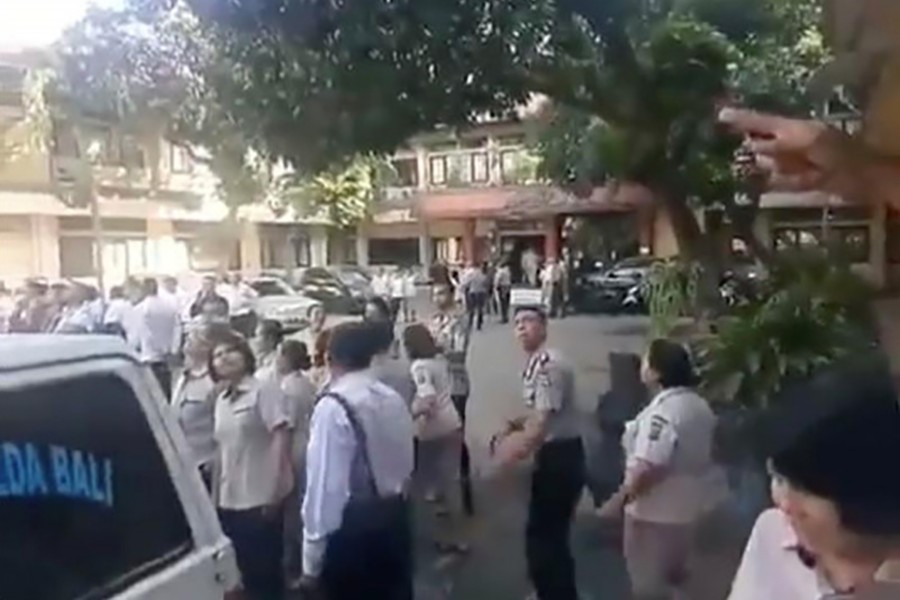 People flee buildings as strong quake hits Indonesia's Bali