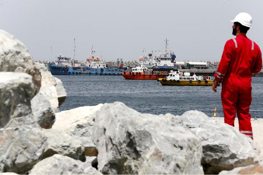 A technical staffer is seen at the Port of Fujairah, United Arab Emirates 	— Reuters