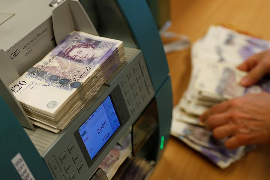 British Pound Sterling banknotes are seen in a counter machine at the Money Service Austria company's headquarters in Vienna, Austria on November 16, 2017 — Reuters/Files