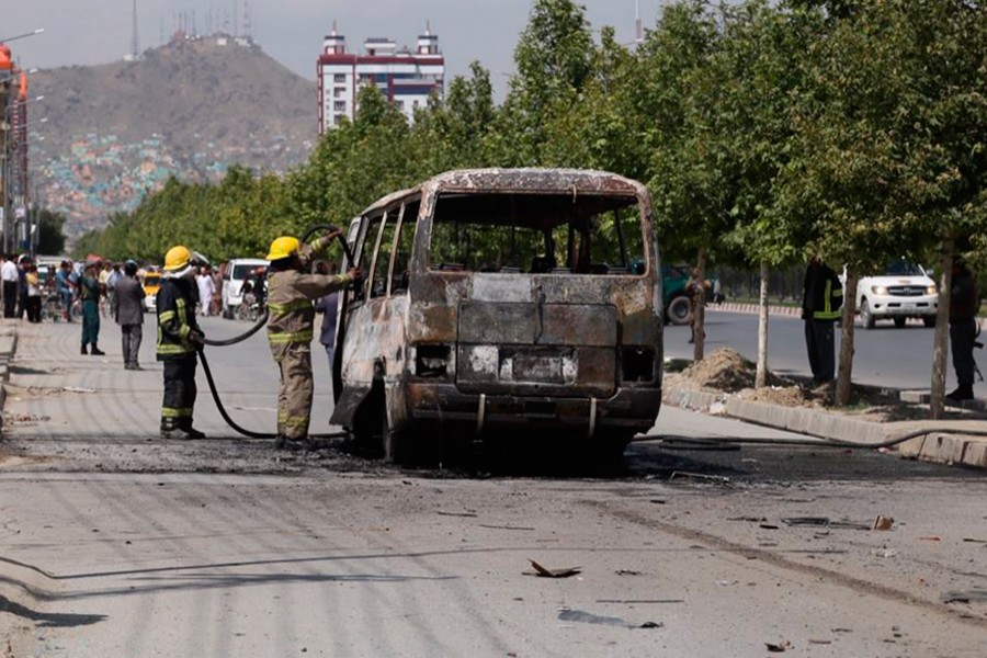 Roadside blast in Afghanistan kills 34 bus passengers