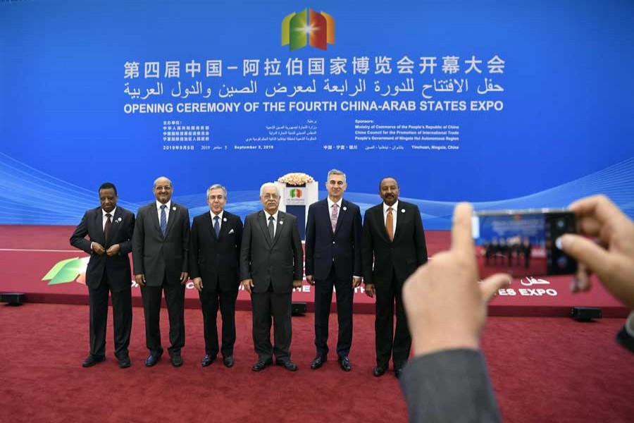 Guests pose for photos during the opening ceremony of the fourth China-Arab States Expo in Yinchuan, capital of northwest China's Ningxia Hui Autonomous Region, Sept. 5, 2019. (Xinhua/Wang Peng)