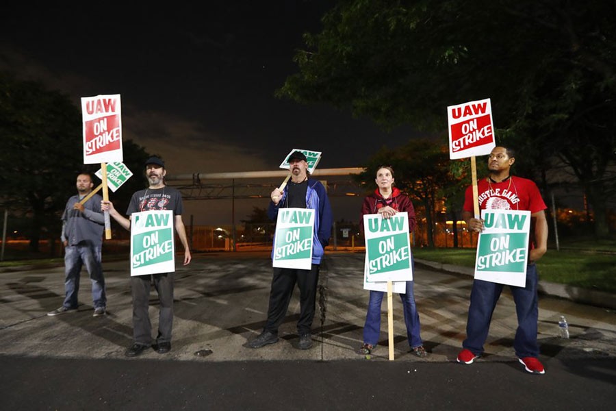 Auto workers strike against GM in contract dispute