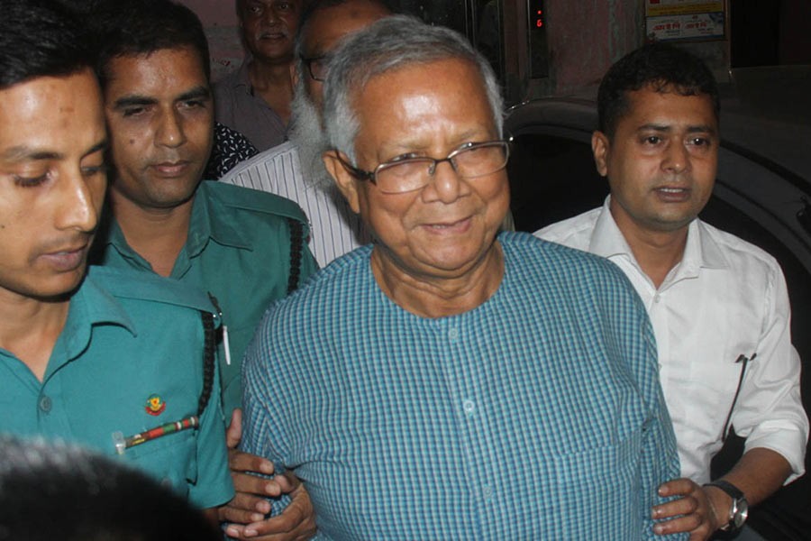 Nobel Laureate Dr Muhammad Yunus going to the Dhaka 3rd Labour Court to surrender before it on Sunday noon. -Focus Bangla Photo