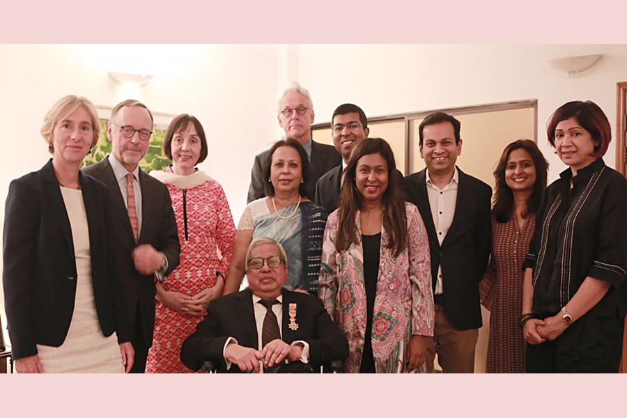 Sir Fazle Hasan Abed receives  the insignia of the Royal Knighthood bestowed upon him by Harry Verweij, Dutch Ambassador to Bangladesh,  in the city on Wednesday