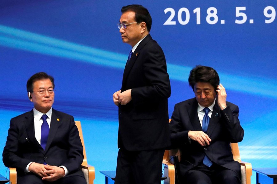 North Korea threat looms as China, Japan, South Korea leaders meet