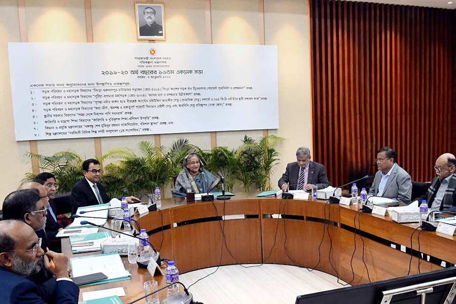 Prime Minister Sheikh Hasina presiding over the ECNEC meeting at the NEC Conference Room in the city’s Sher-e-Bangla Nagar area on Tuesday. -PID Photo