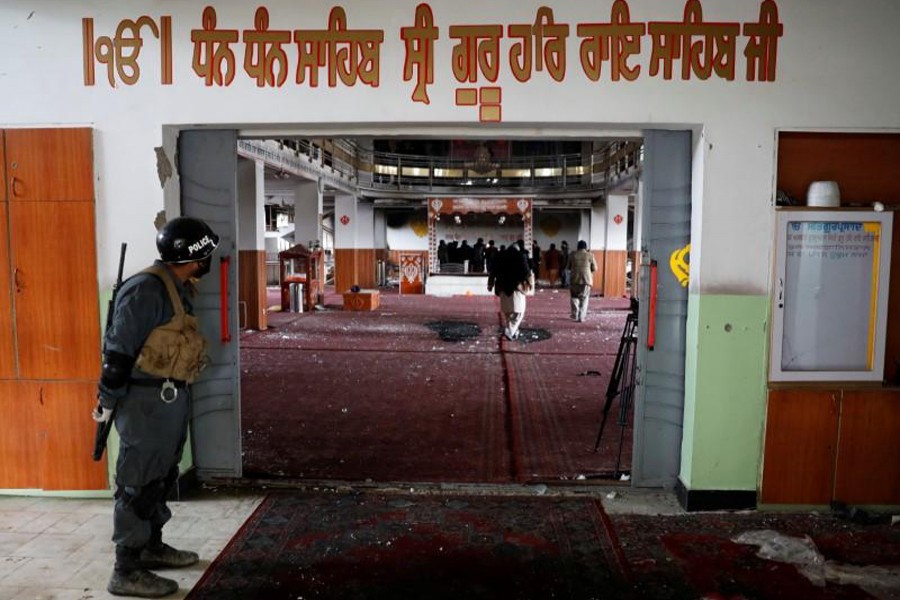 Gunmen in Afghanistan kill 25 at Sikh complex