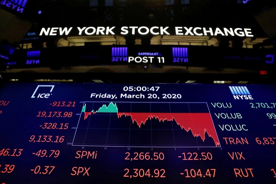 The final numbers of the day are displayed above the floor of the New York Stock Exchange, March 20, 2020. — Reuters/Files