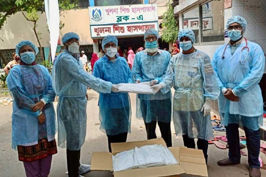 Grameen Fashion and Fabrics Ltd distributing PPEs to Khulna Shishu Hospital, Khulna recently