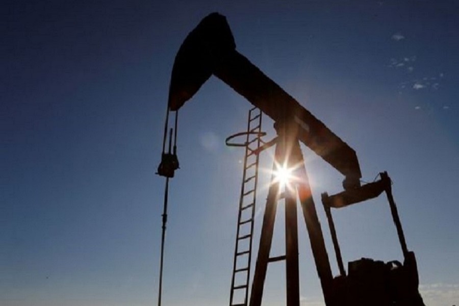 The sun is seen behind a crude oil pump jack in the Permian Basin in Loving County, Texas, US, November 22, 2019. — Reuters