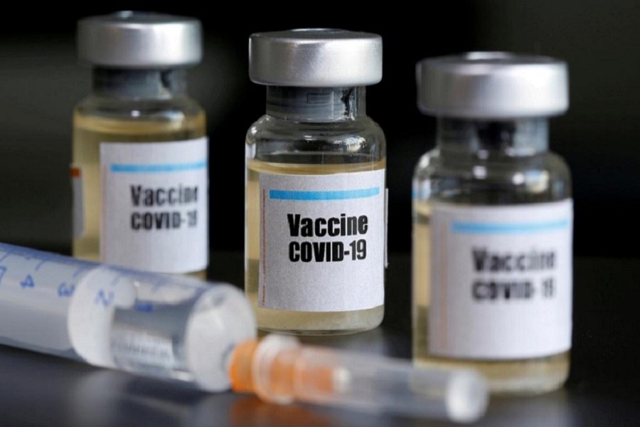 Small bottles labelled with a "Vaccine COVID-19" sticker and a medical syringe are seen in this illustration taken April 10, 2020. — Reuters/Files