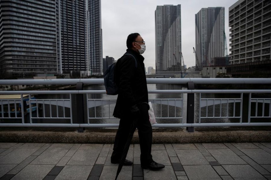 A man wearing a face mask, following an outbreak of the coronavirus, is seen on a street in Tokyo, Japan, last month –Reuters Photo