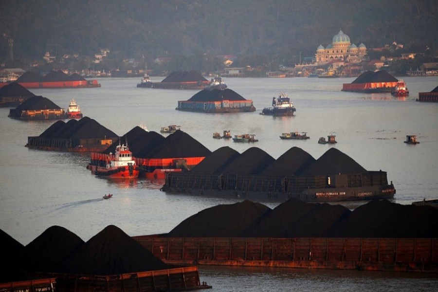Coal barges are pictured as they queue to be pull along Mahakam river in Samarinda, East Kalimantan province, Indonesia, August 31, 2019. — Reuters/Files