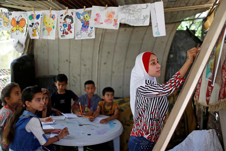 Gaza girl, 13, teaches neighbourhood children during school closure