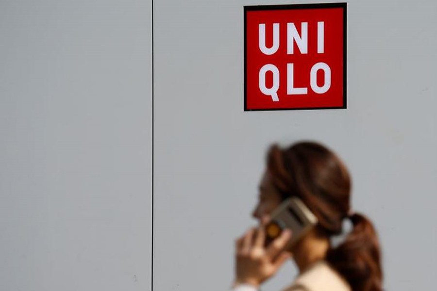 A woman walks past a Uniqlo store at Myeongdong shopping district in Seoul, South Korea on October 22, 2019 — Reuters/Files