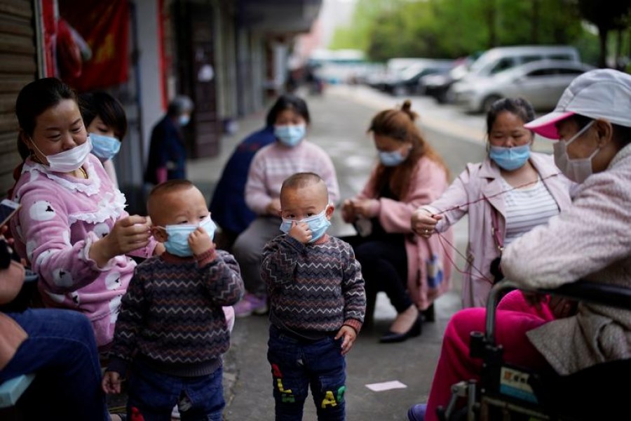 Masks too dangerous for children under two, Japan medical group says