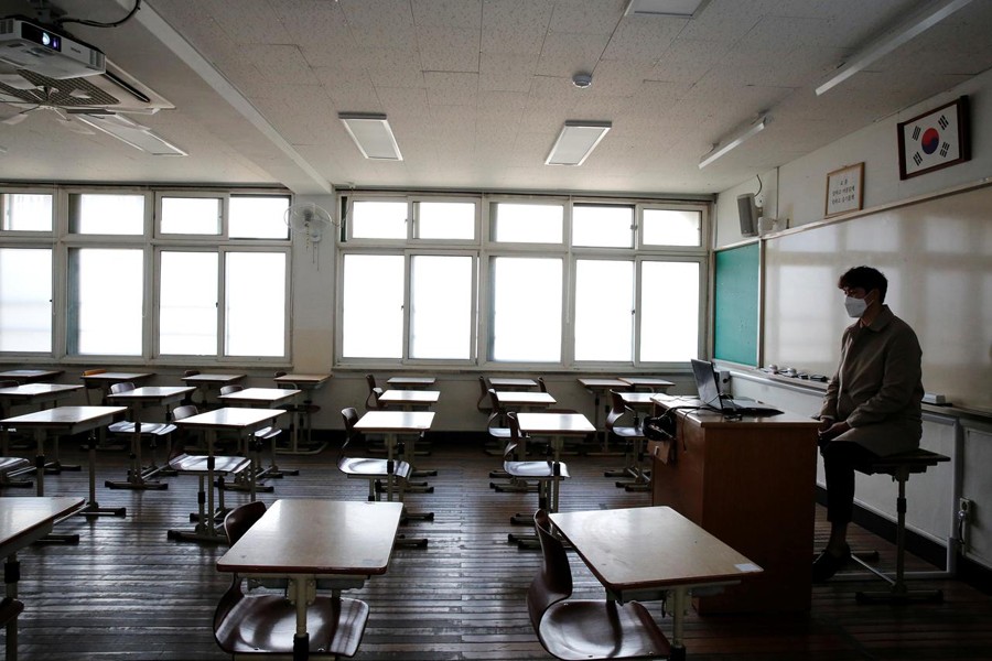 South Korea schools close again over virus spike