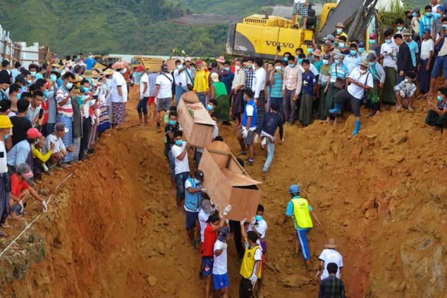 Myanmar digs mass grave after deadly mine landslide