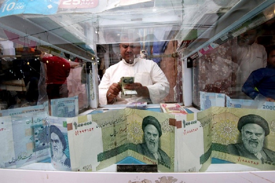Iran rial slides to new low as coronavirus, sanctions weigh