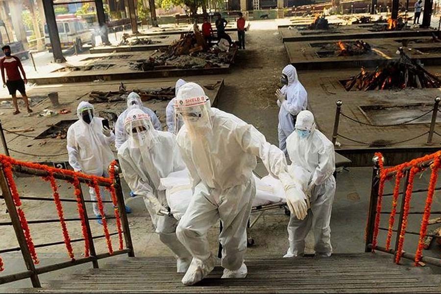 India's virus death toll passes 20,000