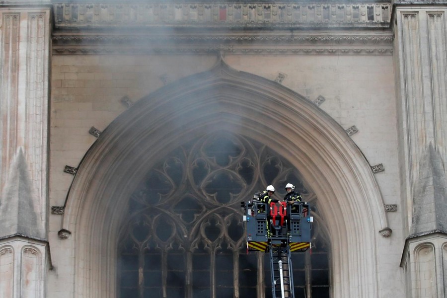 Firemen battle blaze at Nantes cathedral in western France