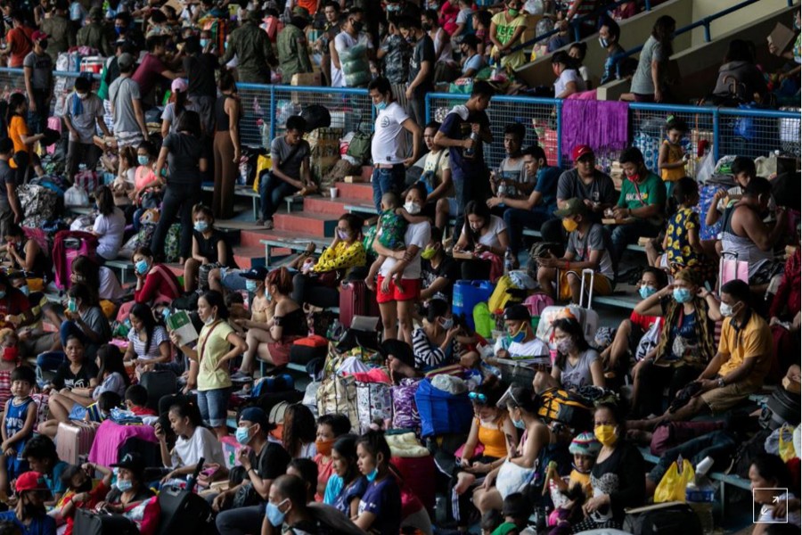 Thousands of stranded Filipinos crammed into stadium amid Covid-19 risks