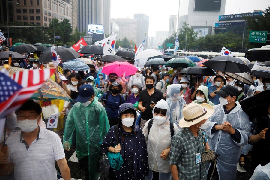 Demonstrators protest against Moon as Seoul scrambles to curb Covid-19 resurgence