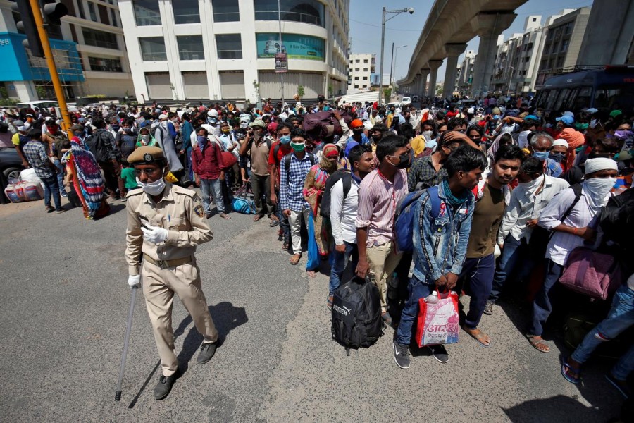 Migrants return to Delhi as India's Covid-19 deaths top 50,000