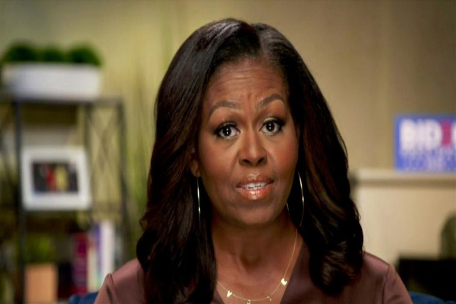 Michelle Obama presses fight for Biden with attack on Trump