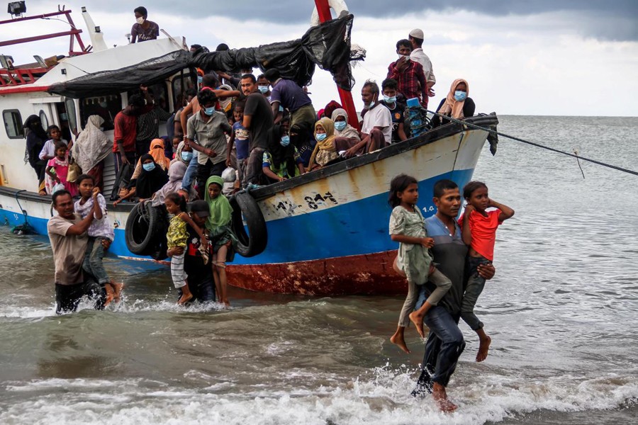 Stranded at sea for months, hundreds of Rohingya land in Indonesia