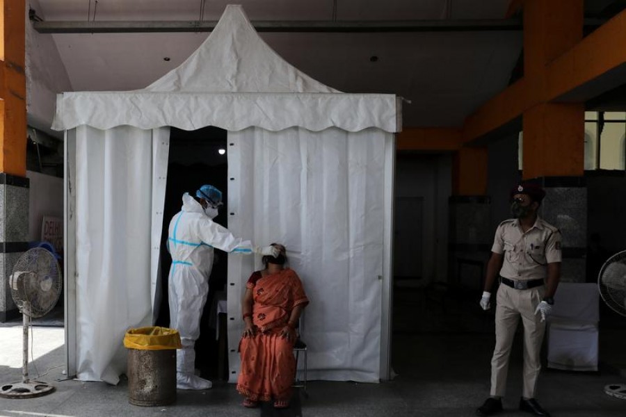 India's coronavirus death toll tops 100,000