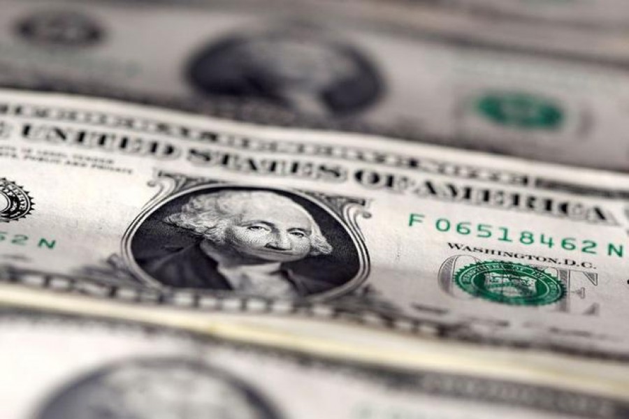 Dollar slips, yuan soars