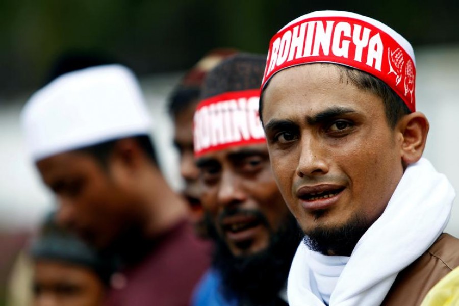 As virus surges in Malaysia, anti-Rohingya sentiment sweeps Facebook