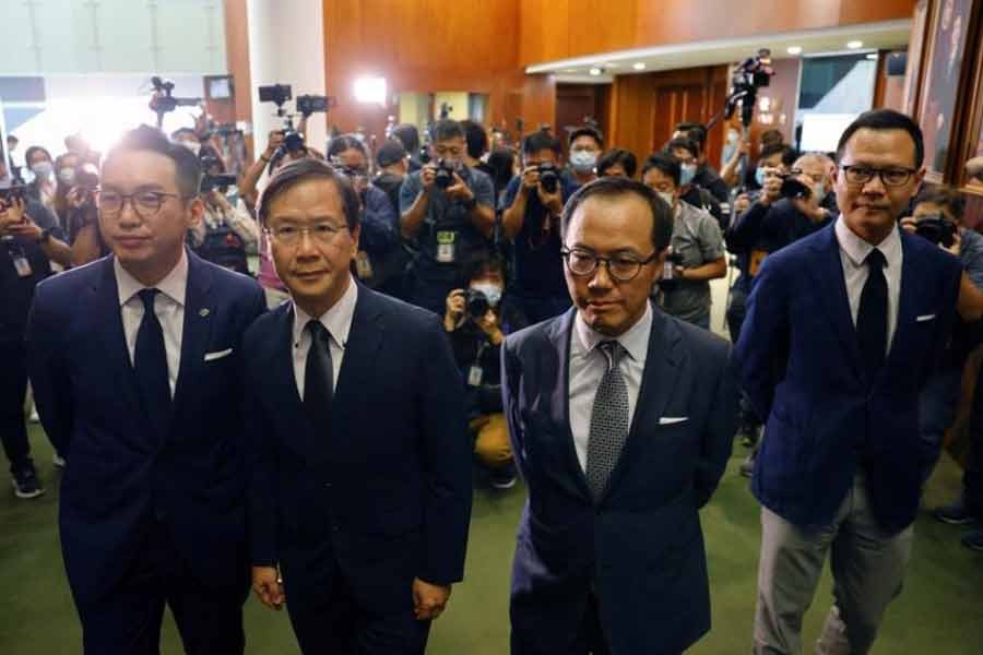 Hong Kong lawmakers to resign en masse as Beijing expels four legislators