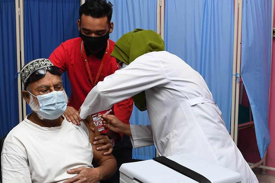 টিকা নেওয়ার পরও কোভিড-১৯ পজেটিভ হওয়ার কারণ