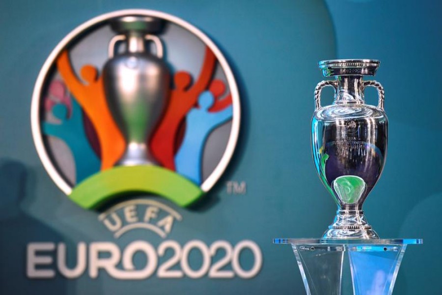 The UEFA EURO 2020 logo on display with the European Championship trophy during the launch — Action Images via Reuters