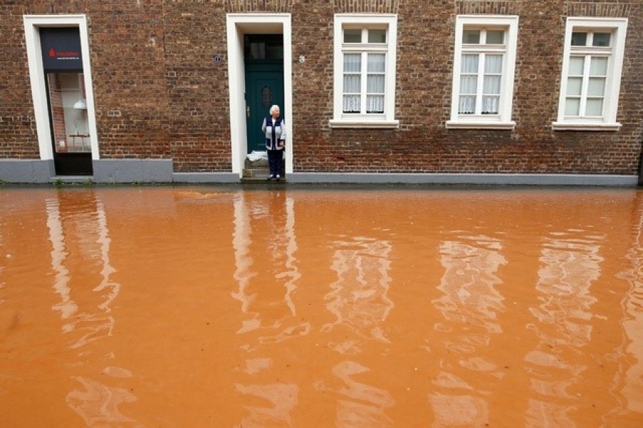 Floods expose climate vulnerability, from China to Germany