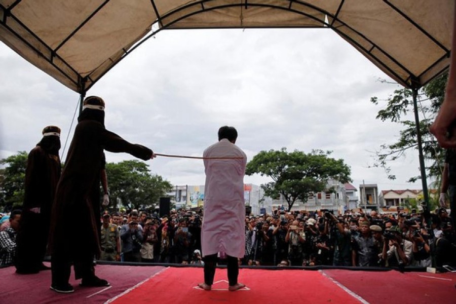 Woman, partner caned over extramarital affair in Indonesia