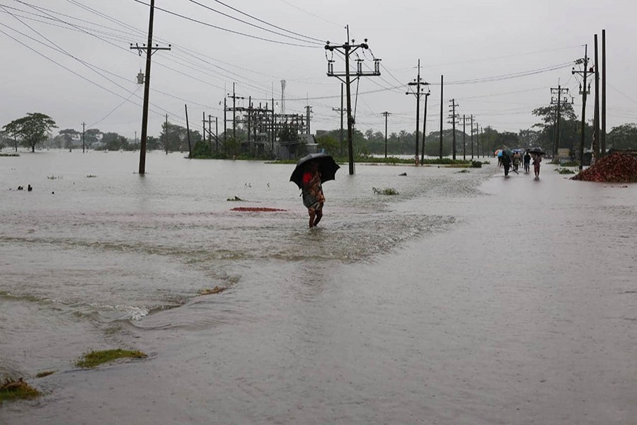 সিলেটে বন্যা পরিস্থিতির অবনতি। জেলার বাধাঘাট এলাকা থেকে শনিবার ছবিটি তুলেছে ফোকাস বাংলা