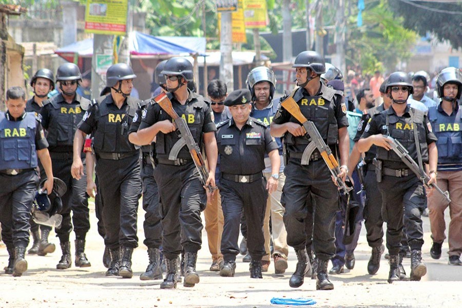 The mlitant suspect is being accompanied by two associates, his two wives, and children, RAB chief Benazir said while briefing the media on Tuesday. - Focus Bangla photo